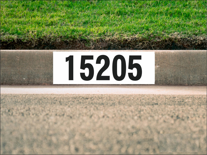 painted curb numbers